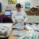 UTQIAGVIK, ALASKA - MONDAY, SEPTEMBER 21, 2017: Anne Jensen, Arctic Anthropologist and Archaeologist with UIC Sciences in Utqiaġvik, looks over some of the artifacts recovered by her team earlier that year at the Walakpa site. Photo: Ash Adams for Gizmodo